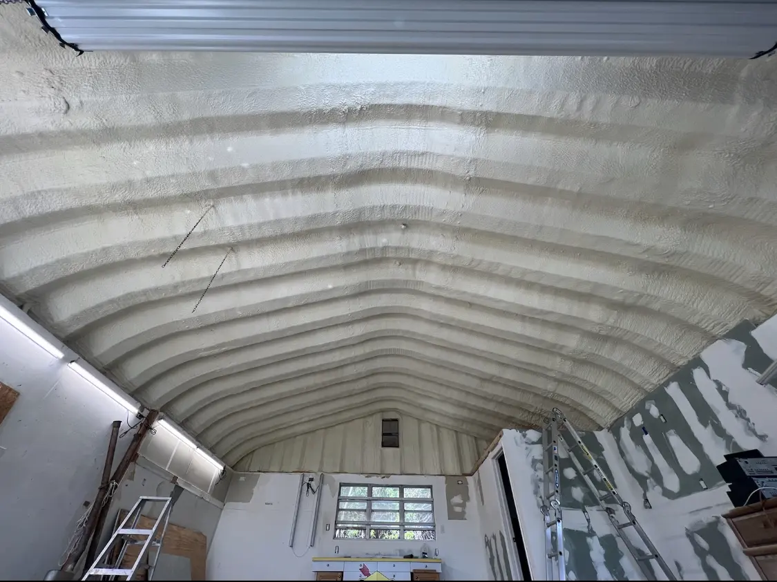 Spray polyurethane foam applied to the underside of a metal roof deck in Cordele